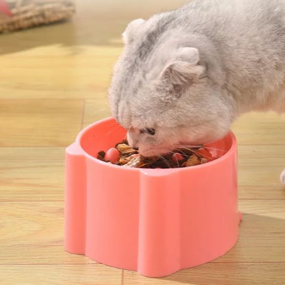 gamelle_anti_glouton_chat_rose_avec_des_croquettes mange